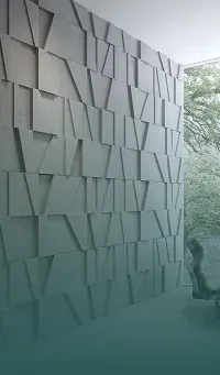 A textured, modern gray wall with abstract shapes