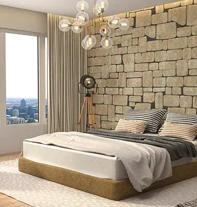 Modern bedroom featuring a stone accent wall